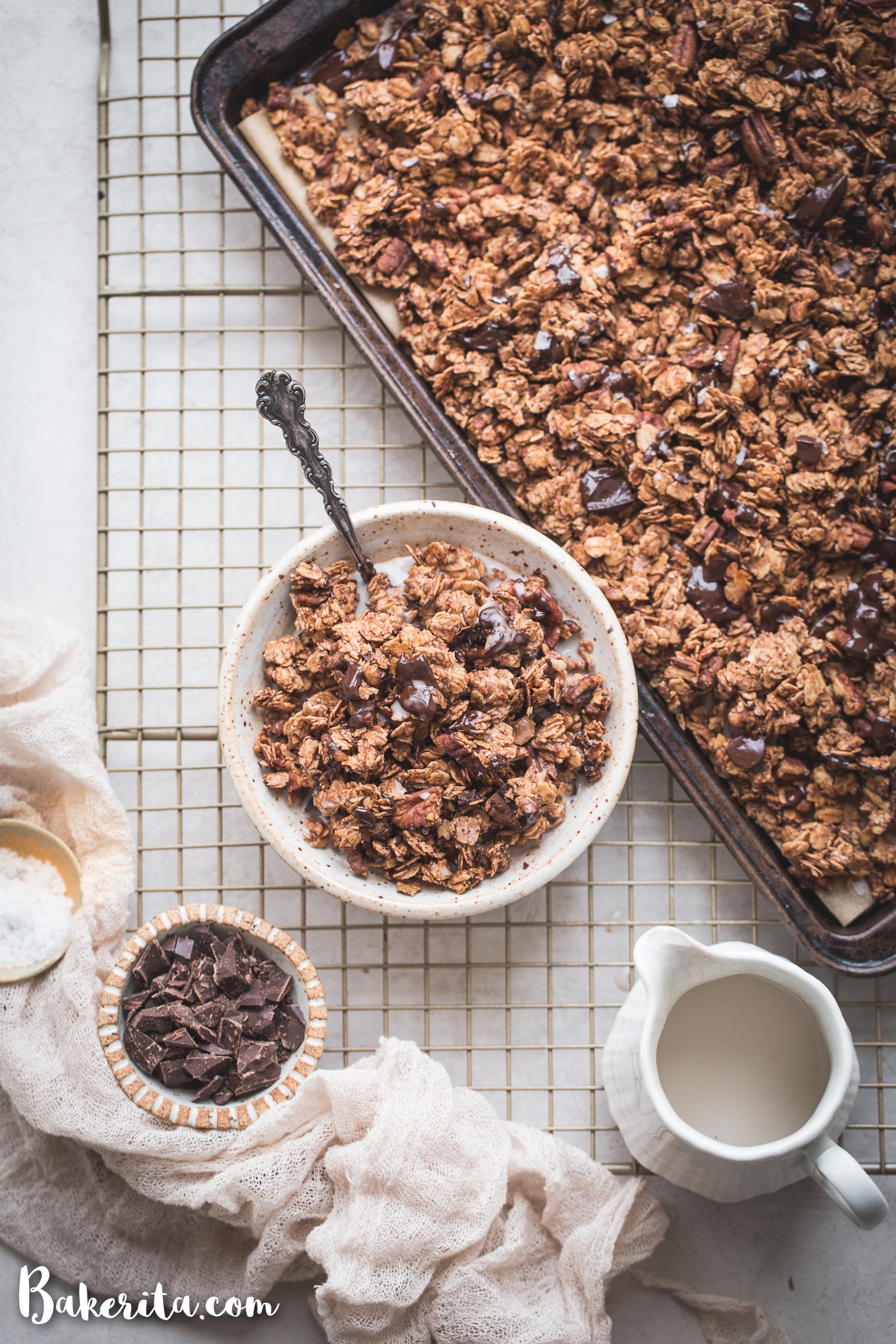 This Easy Chocolate Granola is a simple, gluten-free and vegan recipe that's made with just 8 ingredients! It's perfect served with dairy-free milk, sprinkled over yogurt, or eaten by the handful.