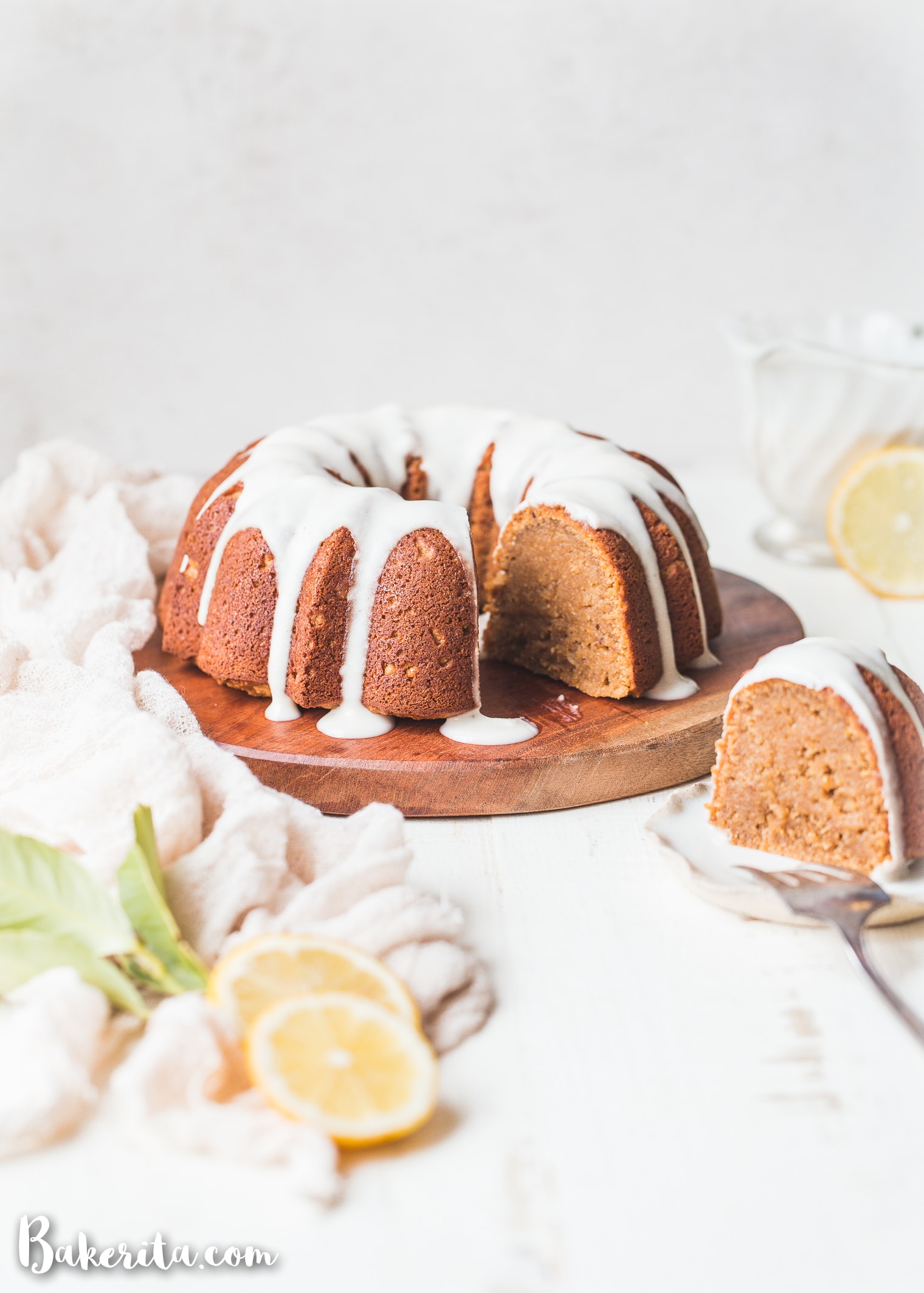 You'll love this easy-to-make Gluten-Free Vegan Lemon Cake! It is simple and elegant with a moist & airy crumb. To top it all off, we drizzle this paleo & refined sugar-free cake with a tangy lemon drizzle. 
