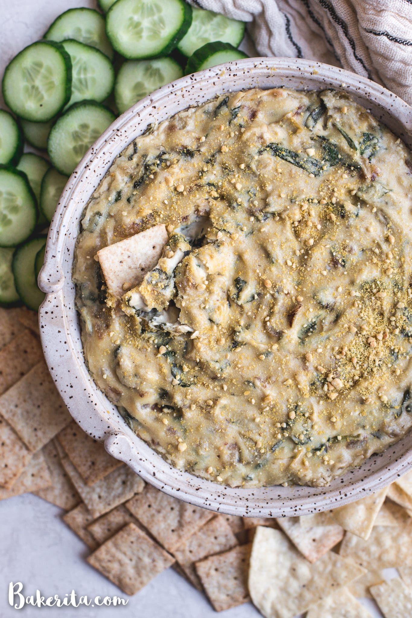 Vegan Spinach Artichoke Dip: tastes as good as the original, but it's dairy-free, soy-free, gluten-free, and Whole30! No processed ingredients here - just whole, plant-based foods. It's perfect as an appetizer or for game day.
