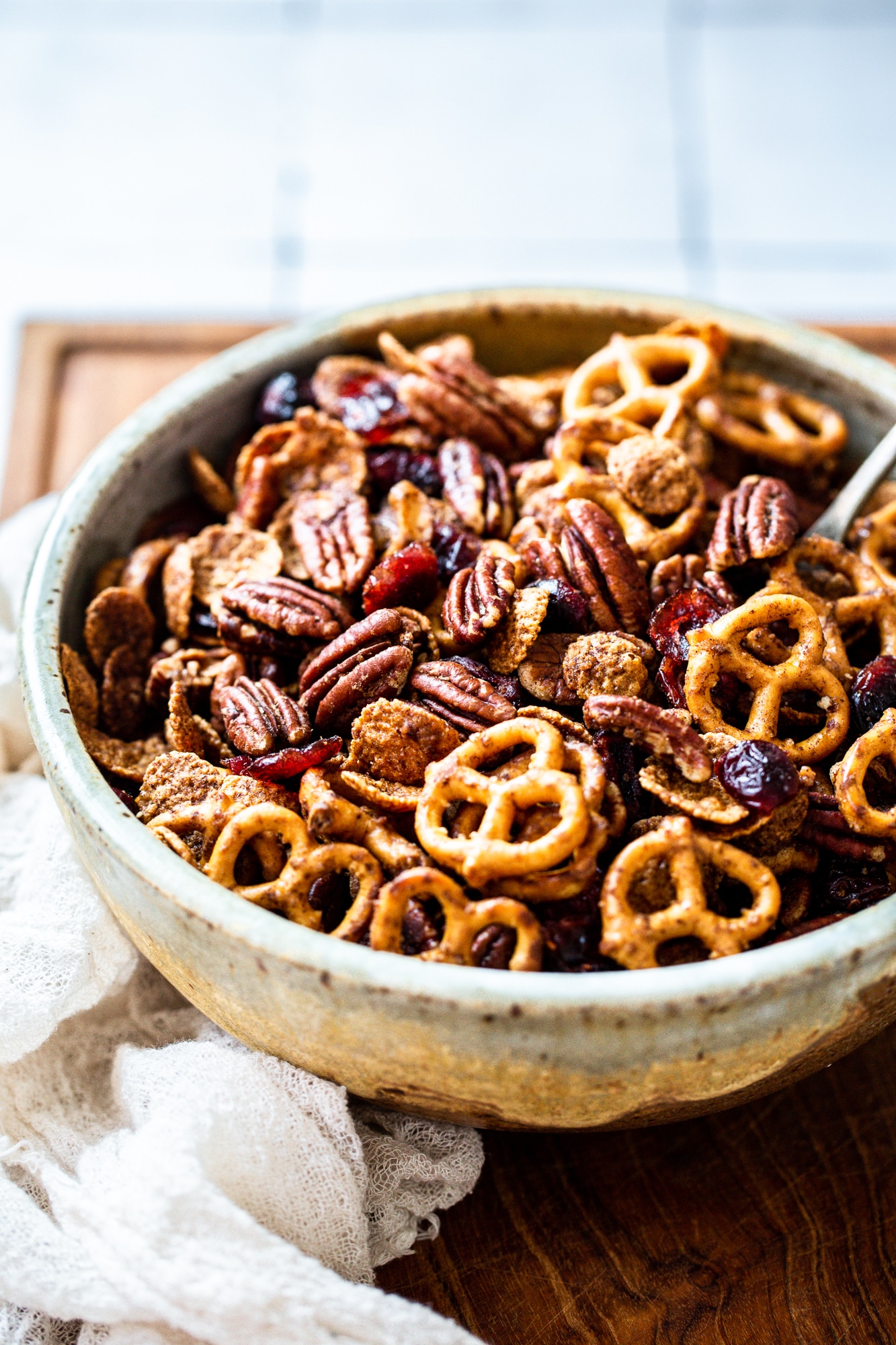 This Healthy Pumpkin Spice Snack Mix is crunchy, sweet, and SO easy to make with just seven ingredients! It's perfect for snacking on, using as a crunchy topping, or giving as a gift.