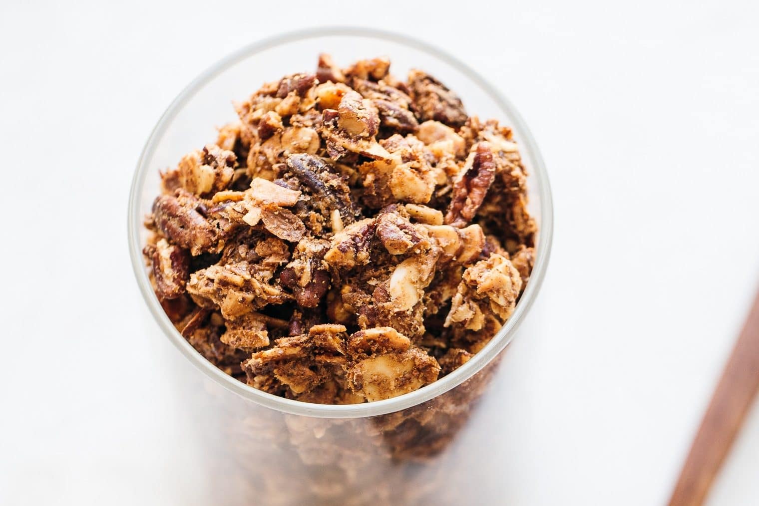 This 5-Ingredient Grain-Free Granola is the perfect simple granola recipe, minus the grains! It uses nuts and coconut in place of the oats to make a filling and delicious vegan & paleo granola.